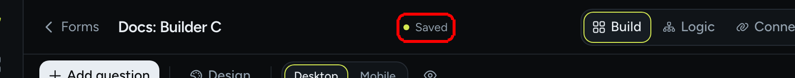 The editor topbar with the save status pill reading Saved